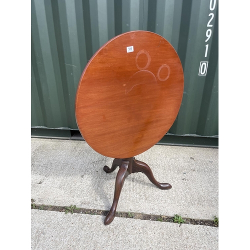 309 - A circular victorian mahogany snap top tripod table