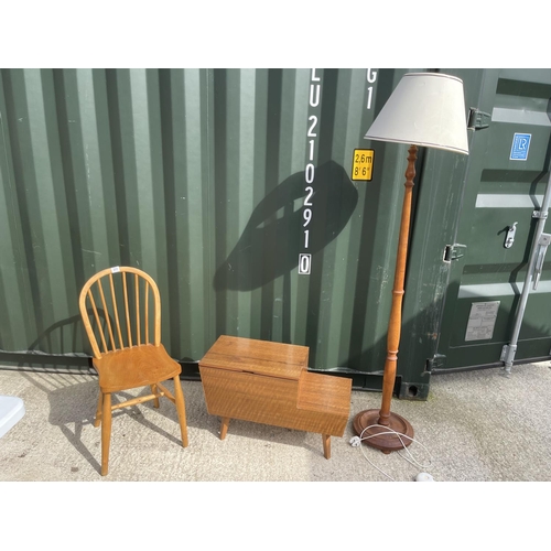 311 - An ercol style stick back chair together with a retro sewing box and a standard lamp