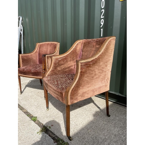 314 - A pair of Edwardian inlaid salon chairs upholstered in brown