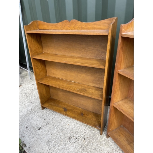 316 - Two oak open fronted bookcases