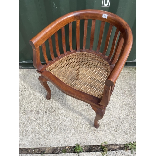 317 - A smokers bow back chair with begere seat