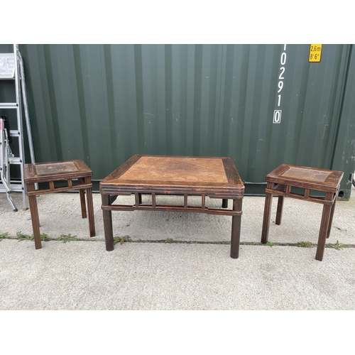 328 - A large oriental style hardwood coffee table 90x90 together with two matching lamp tables