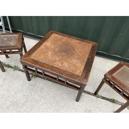 328 - A large oriental style hardwood coffee table 90x90 together with two matching lamp tables