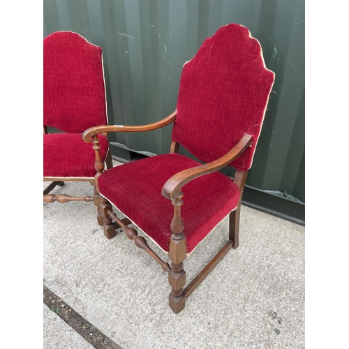 329 - A pair of red upholstered children's chairs