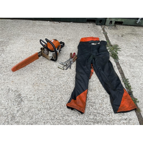 338 - Stihl ms211 chainsaw with sharpening files and trousers