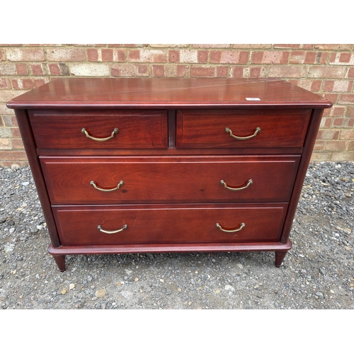 34 - A pair of dark wood chests together with matching dressing table