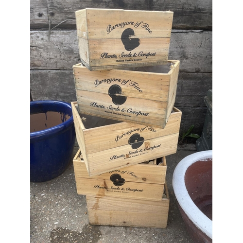 384 - Three sets of three new wooden garden crates