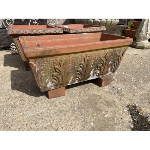 387 - A weathered terracotta rectangular trough