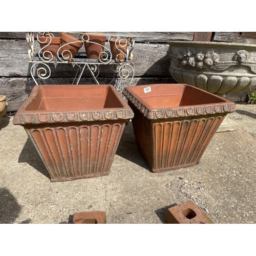 388 - A pair of weathered square shape terracotta planters