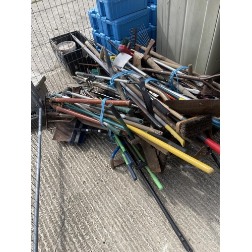 393 - 7 large bundles of assorted garden hand tools