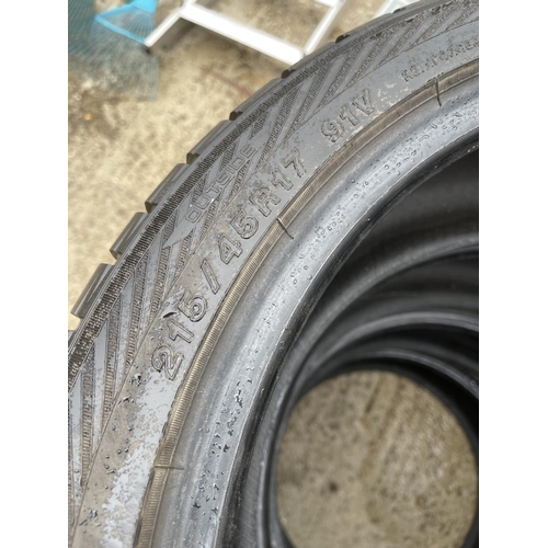 401 - A set of four yokohama tyres with good tread 215/45/17