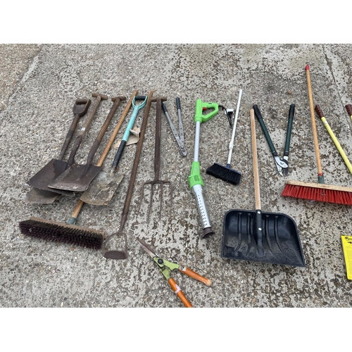 404 - A collection of garden tools including spades, shovels and other tools