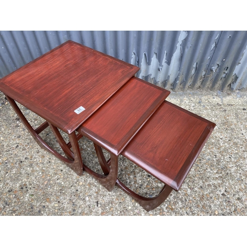 65 - A g plan teak nest of three occasional tables