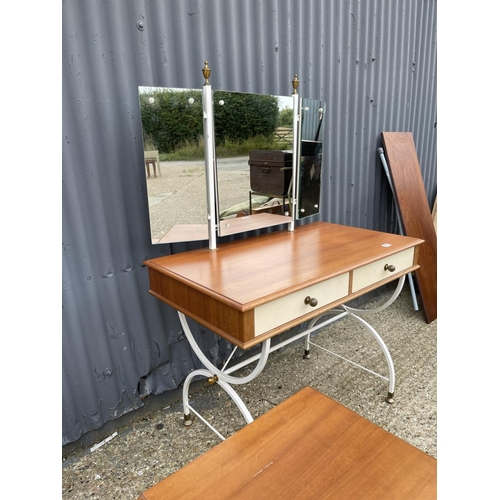 89 - A mid century teak dressing table together with matching bedside