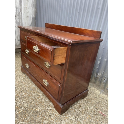 9 - An Edwardian mahogany chest of four drawers 112x50x77