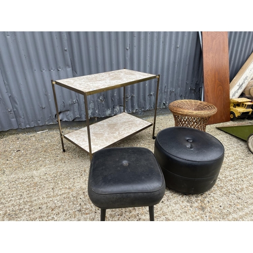 90 - A mid century brass tea trolley together with two poof and wicker stand