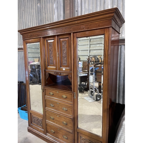 101 - A large Victorian three section compactum wardrobe