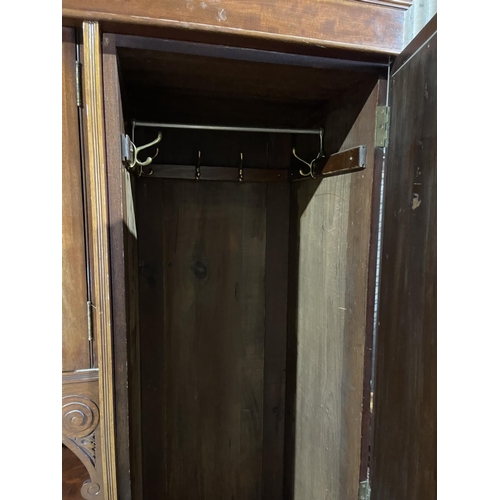 101 - A large Victorian three section compactum wardrobe