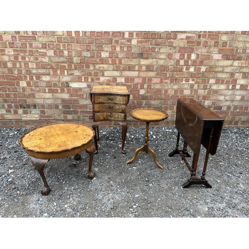 11 - A small walnut chest of three together with a walnut pie crust occasional table, a wine table and an... 