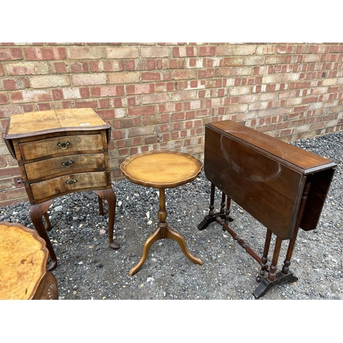 11 - A small walnut chest of three together with a walnut pie crust occasional table, a wine table and an... 