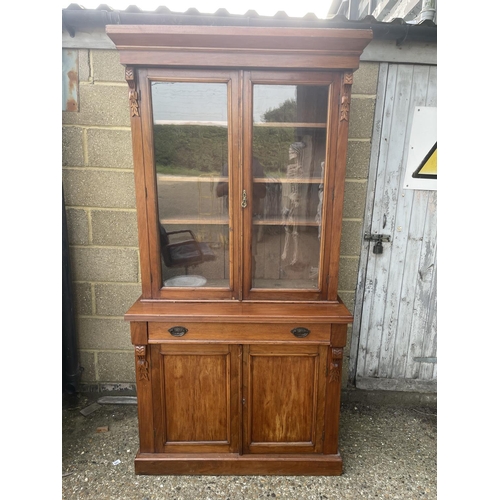 128 - An Edwardian mahogany bookcase cupboard  105x45x205