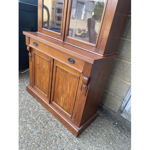 128 - An Edwardian mahogany bookcase cupboard  105x45x205