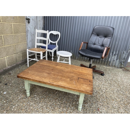 129 - A french style painted pine coffee table, two painted chairs, painted stool and office chair