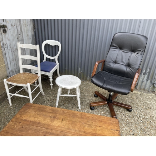 129 - A french style painted pine coffee table, two painted chairs, painted stool and office chair