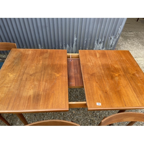 146 - A g plan teak extending dining table together with six teak chairs (possibly kofod Larsen unmarked)