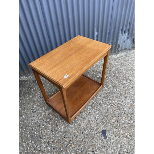 149 - A mid century teak tea trolley with fold over top