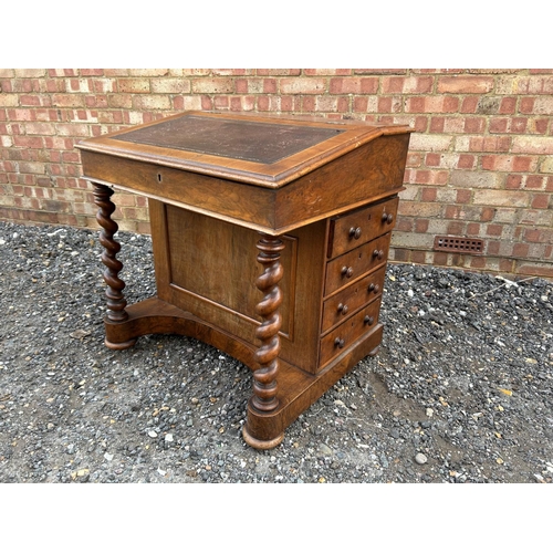 15 - A wide Victorian mahogany davenport desk with four drawers and four dummy drawers  73x60x77