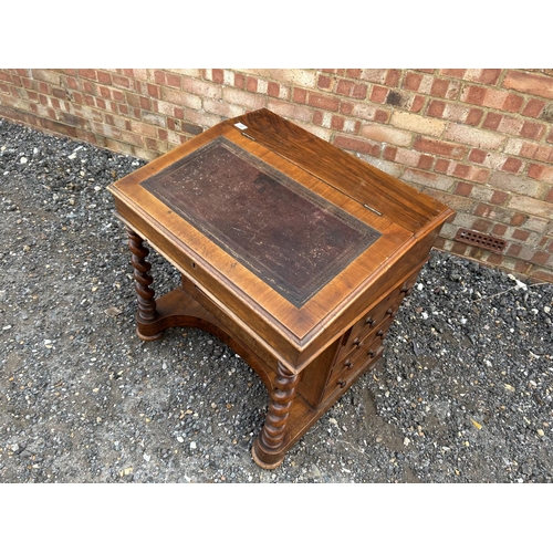 15 - A wide Victorian mahogany davenport desk with four drawers and four dummy drawers  73x60x77