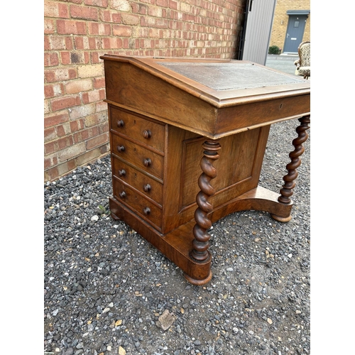 15 - A wide Victorian mahogany davenport desk with four drawers and four dummy drawers  73x60x77