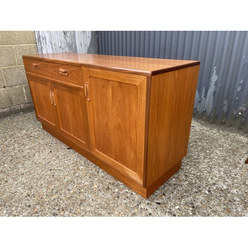 160 - A mid century g plan  teak sideboard with drawer and three cupboards