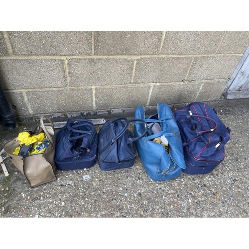 179 - Four sets of Bowls in bags, bag of golf balls and boule set