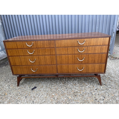 183 - A mid century austin suite chest of 8 drawers 132x46x70