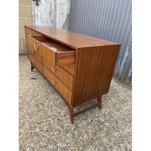 183 - A mid century austin suite chest of 8 drawers 132x46x70