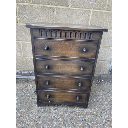 185 - An oak chest of four drawers