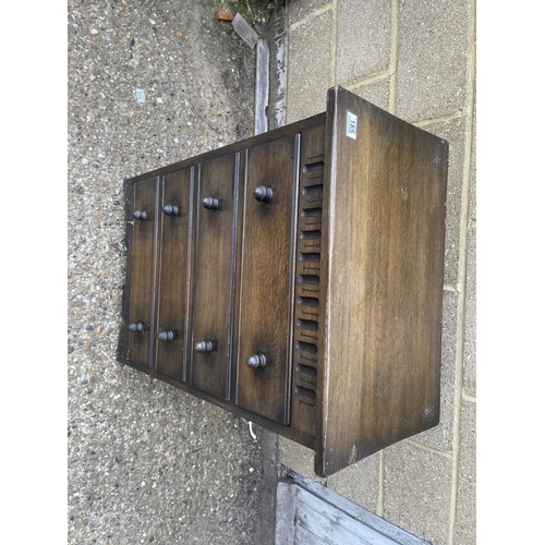 185 - An oak chest of four drawers