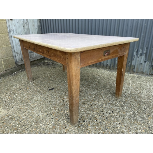 186 - A country pine kitchen table with drawer and red formica top 96x152