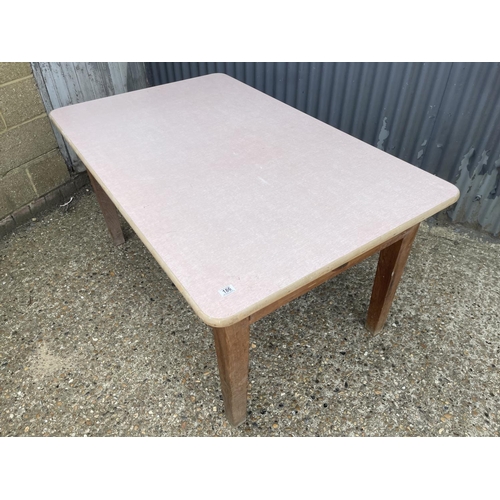 186 - A country pine kitchen table with drawer and red formica top 96x152