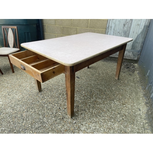 186 - A country pine kitchen table with drawer and red formica top 96x152