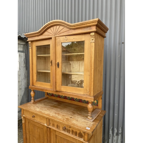 191 - CONTINENTAL PINE BOOKCASE CUPBOARD WITH TILED SECTION