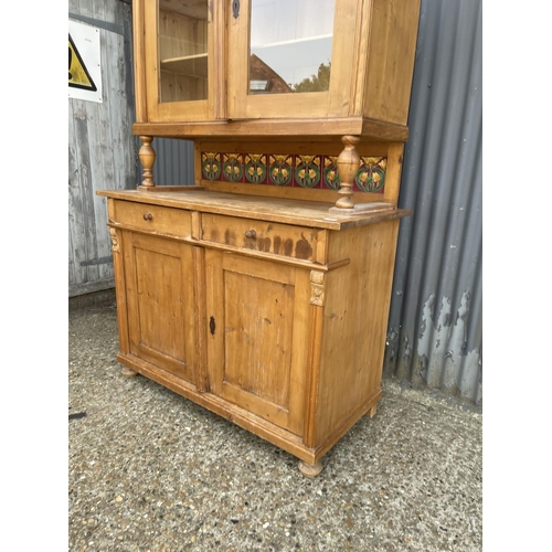 191 - CONTINENTAL PINE BOOKCASE CUPBOARD WITH TILED SECTION