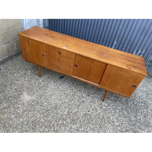 192 - A mid century teak sideboard