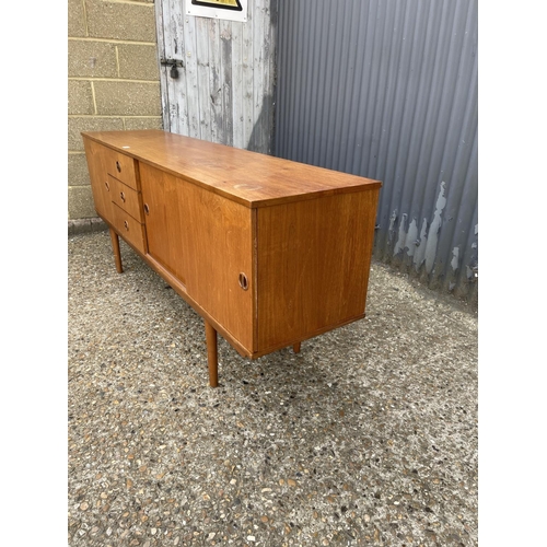 192 - A mid century teak sideboard