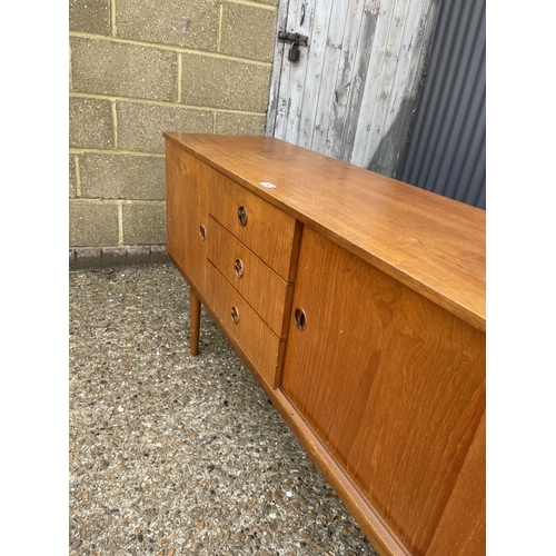 192 - A mid century teak sideboard