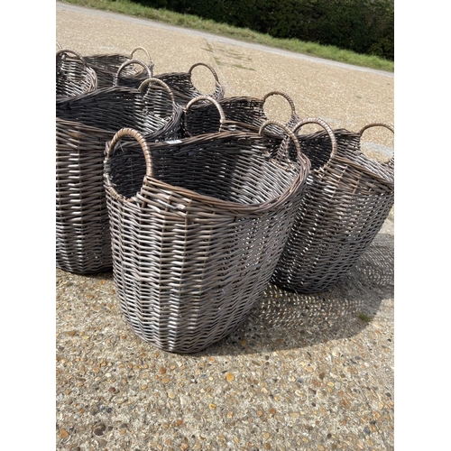 198 - Seven large new wicker baskets matching