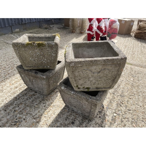 214 - Four square concrete planters