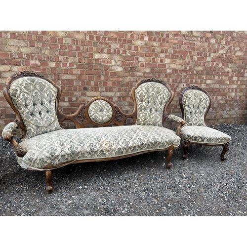 22 - A Victorian walnut framed three piece salon suite consisting of settee, ladies chair and a gents arm... 